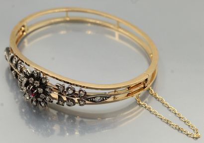 null 18K (750) gold and silver openwork bangle decorated with flowers and foliage,...