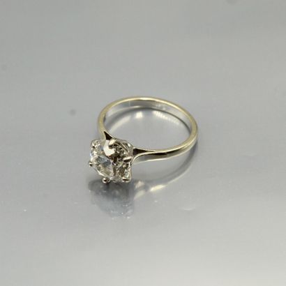 null 18K (750) white gold ring set with an old cut diamond.

Hallmark M.

Eagle head...