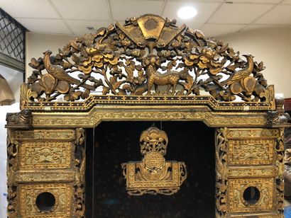 null Buddhist altar in carved wood lacquered in black and gold, opening in the lower...