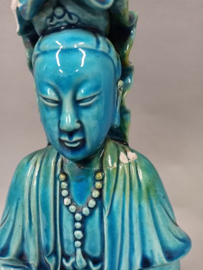null CHINA - Circa 1900

Statuette of Guanyin enamelled turquoise on the biscuit,...