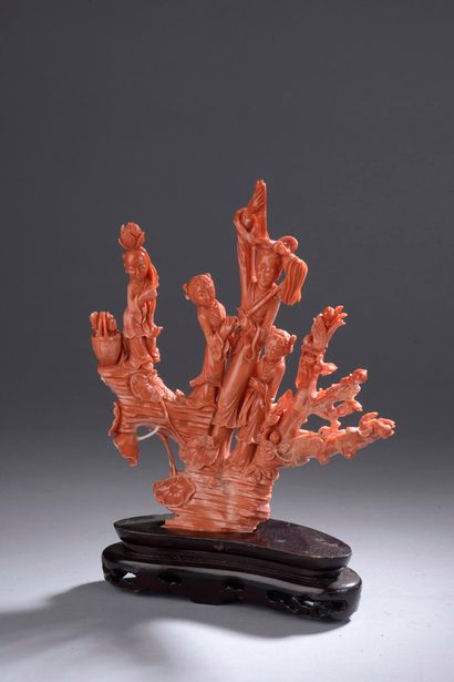 null CHINA - Early 20th century

Red coral group, young woman on a rock near a peach...