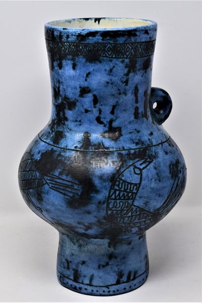 null 
BLIN Jacques (1920-1995)


Blue glazed ceramic pitcher with black patina and...