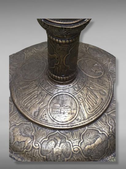 null Oriental inspired lamp

Metal with embossed, openwork and engraved decoration,...