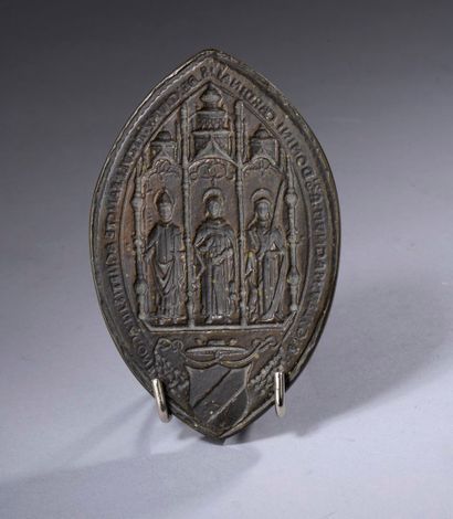 Bronze seal in the form of a shuttle of Claude...
