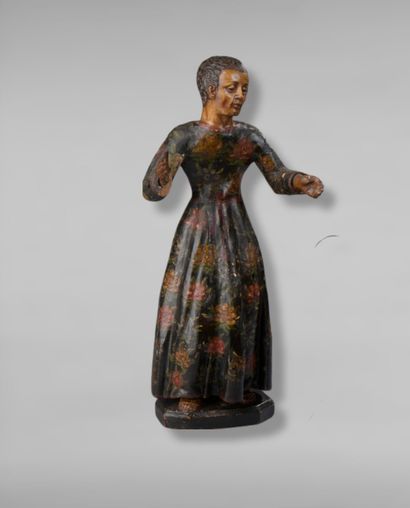 Wooden figure carved in the round and polychromed,...