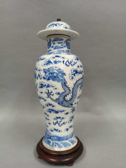null CHINA - Late 19th century

Porcelain vase with blue underglaze decoration of...