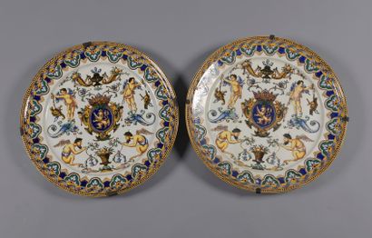 null 
GIEN




Pair of large round dishes decorated with polychrome grotesques surrounding...