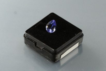 null Tanzanite pear on paper.

Weight : 1.97 crts