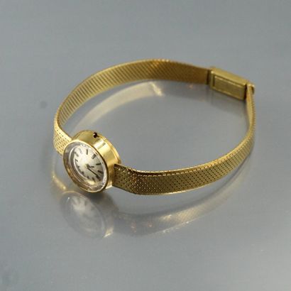 null TISSOT 

Montre de dame, boîte et bracelet maille serpent en or jaune 18k (750)....