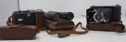 null Camera, binoculars. Set of two folding cameras, with bellows (Kodak and Royer...