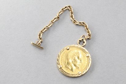  Pièce en or de 20 francs Napoléon III tête laurée, montée en porte-clefs, monture...