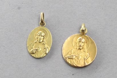 null Deux médailles religieuses en or jaune 18k (750).

Poids : 2.50 g.