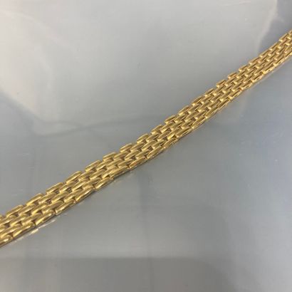 null Collier en or jaune 18k (750) à maille grain de riz.

Poinçon tête d'aigle.

Tour...