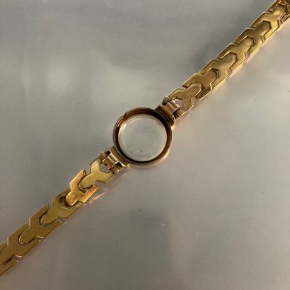 null 18k (750) yellow gold watch scrap. 

Marked with an eagle's head. 

Gross weight:...