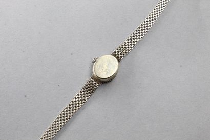 null Debris: 18k (750) white gold wristwatch, the bezel set with diamonds, Flamor...