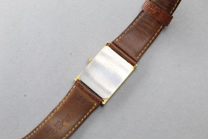 null CITIZEN Quartz 

Men's wristwatch, rectangular case in gold-plated metal, dial...