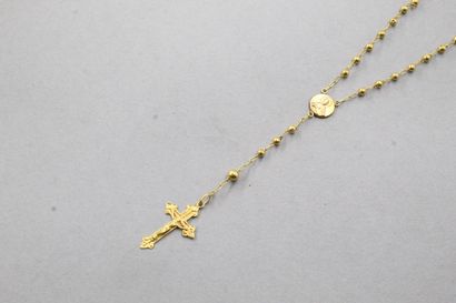 null Rosary in 18k (750) yellow gold.

Around the neck : 40 cm. - Weight : 3.81 ...