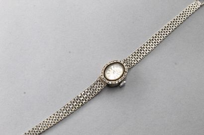 Debris: 18k (750) white gold wristwatch,...