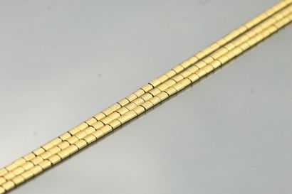  Bracelet en or jaune 18k (750). 
Tour de poignet : env. 20,5 cm - Poids brut : 22.49...
