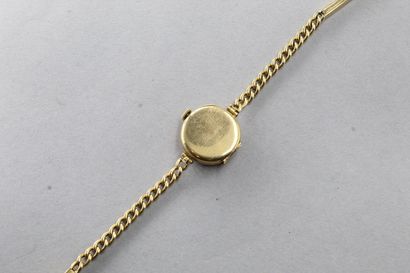 null Montre bracelet de dame en or jaune 18k (750), boîtier rond, cadran à fond gris...
