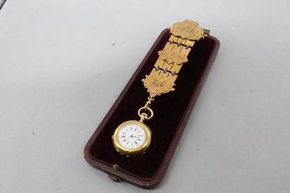 null Chatelaine en or 18k (750) articulée à décor de palmettes et de feuilles d'acanthe,...