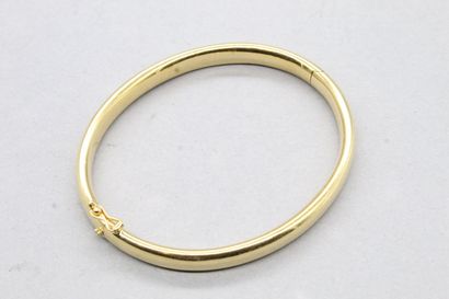 null Bracelet jonc ouvrant en or jaune 18k (750).

Tour de poignet : env. 19 cm -...