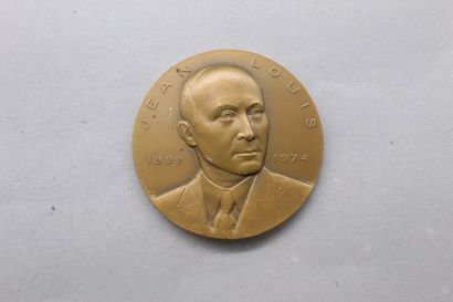 null Médaille de table en bronze 

Avers buste de Jean Louis 1899-1974, sg. : R Cochet.

Revers...