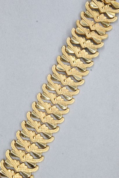 null Bracelet ruban en or jaune 18k (750). 

Longueur : 19 cm. - Poids : 28,11 g...