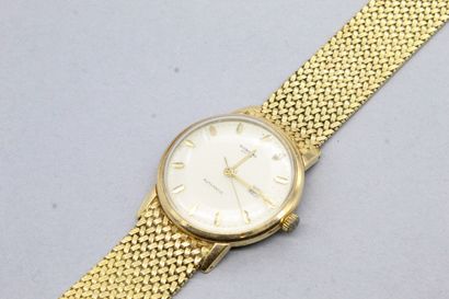 null Débris d'or : épave de montre bracelet en or jaune 18k (750).

Poids brut :...