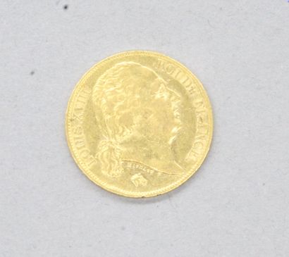 null Pièce en or de 20 francs Louis XVIII buste nu 1818 A.

A : atelier Paris.

TB...