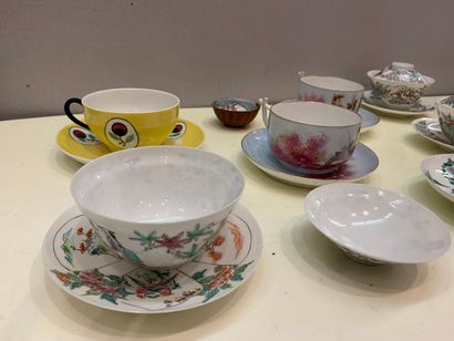 null LOT of porcelain including:



- Pair of porcelain cups and saucers with polychrome...