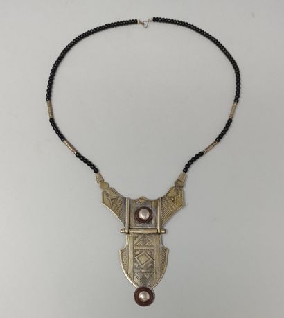 null Tuareg pectoral necklace in metal enhanced with half metal spheres and engraved...