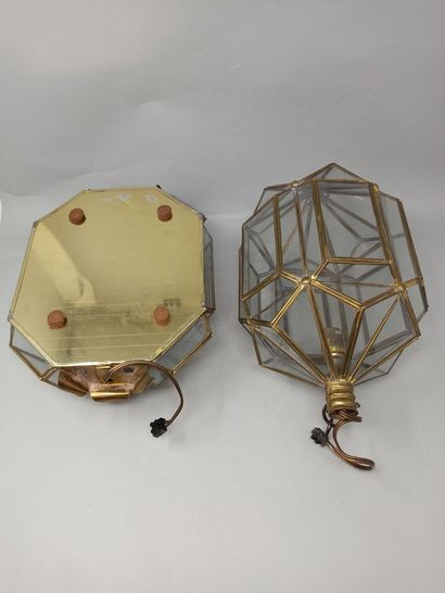 null Lantern and a faceted hallway sconce in brass and glass tiles.