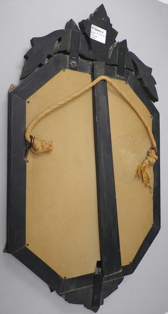 null Venetian mirror of octagonal form with pediment, engraved decoration of flowers,...