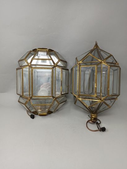 Lantern and a faceted hallway sconce in brass...