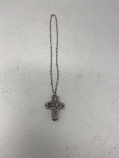 null Openwork reliquary cross and a silver chain engraved with scrolls surrounding...