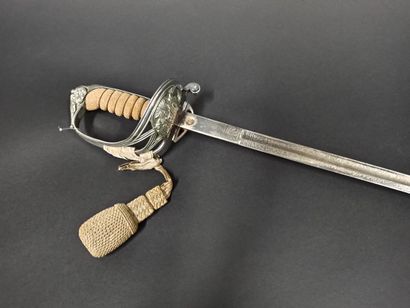 null Officer's saber of the Thai Royal Guard.

With its strap and engraved blade.

20th...