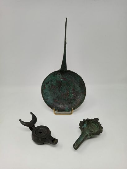 Oil lamp with scroll spout and elm moon reflector

A...