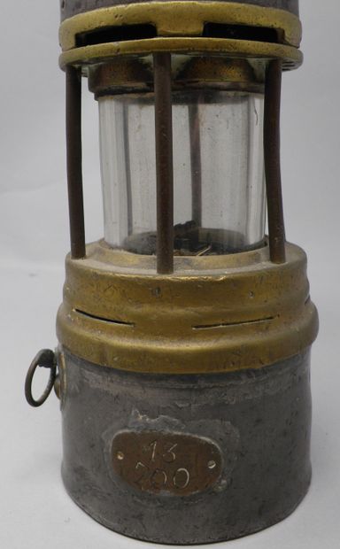 null Miner's safety lamp, Arras type, in riveted sheet metal, brass and glass. Numbered...