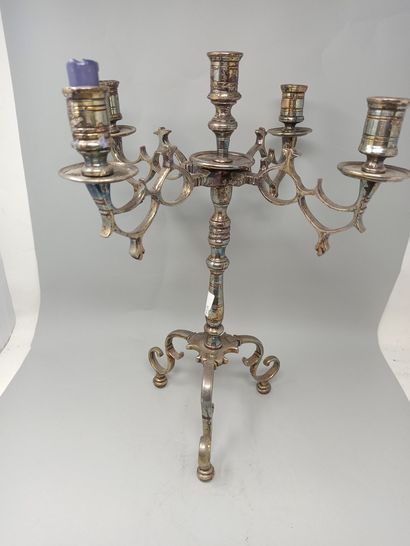 null Candlestick with 5 arms of light in silver plated metal.

Moroccan work around...