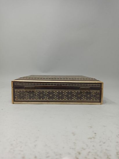 null Small wooden box inlaid with ivory and tinted ivory decorated with geometric...