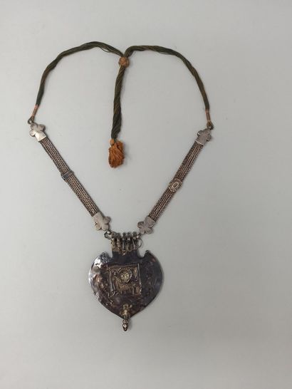 null Silver pectoral necklace decorated with a stylized lion and a horse worked with...