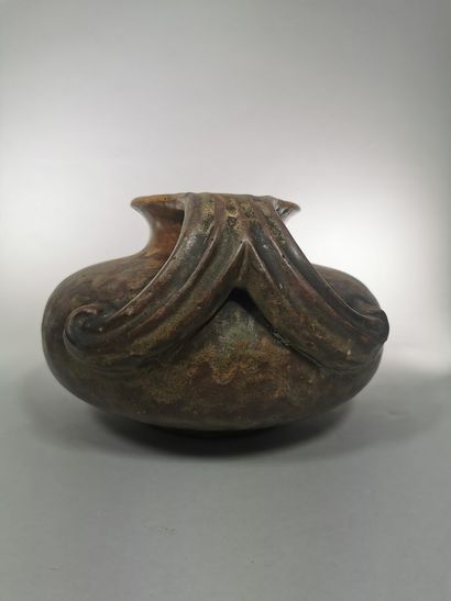 null Vase ball out of stoneware with two handles, carries a mark SEVRES on the side.

H.:...