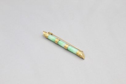 null 
9K (375) yellow gold barrette brooch with jade and jadeite. Pin in 18K (750)...