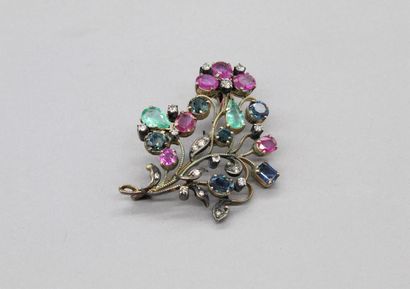 null 14K (585) yellow gold and silver brooch with foliage set with diamonds, sapphires,...