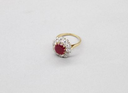 null 18K (750) yellow gold and platinum daisy ring set with an oval ruby surrounded...