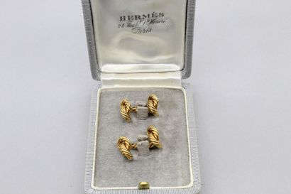null 
HERMÈS 




Pair of cufflinks in 18K (750) yellow gold with twisted decoration....