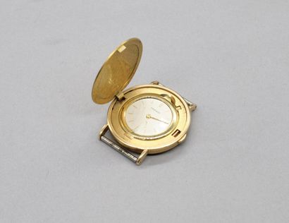 null Watch in the form of a coin in 18K (750) gold. Concealed case. Gold dial. Dial...