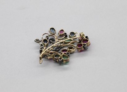 null 14K (585) yellow gold and silver brooch with foliage set with diamonds, sapphires,...