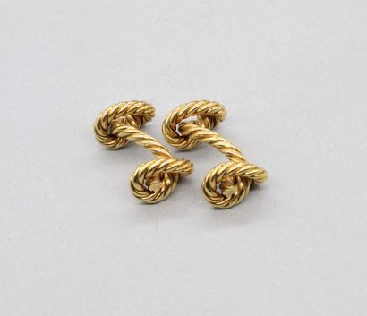 null 
HERMÈS 




Pair of cufflinks in 18K (750) yellow gold with twisted decoration....